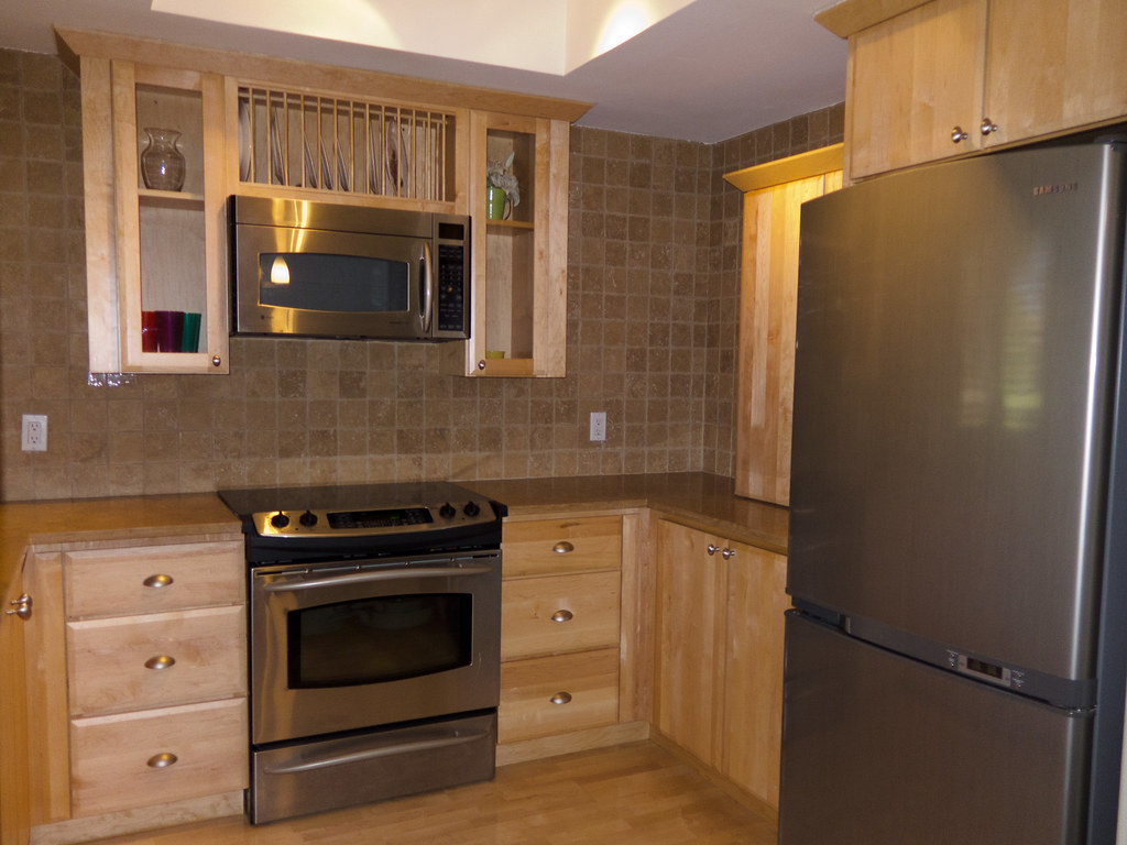 Completed professional kitchen with updated cabinets